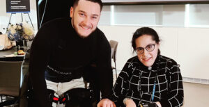 Esther and a Wandercraft therapist at a demo for the Atalante X exoskelton. 